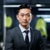 黄瓜视频首席技术官陈明远头像，专业男性，西装干练，科技公司办公室背景